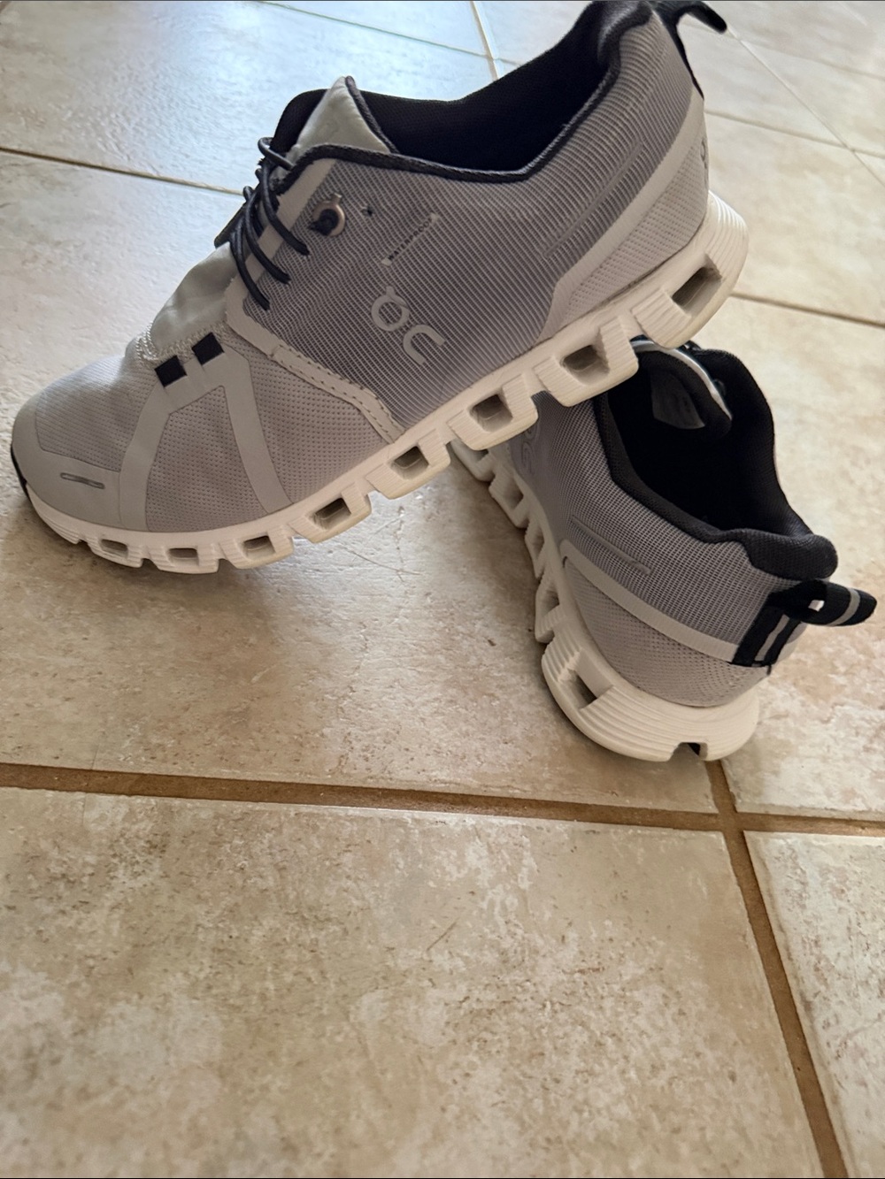 On Running Men’s White and Black Cloudflow-Style Sneakers
